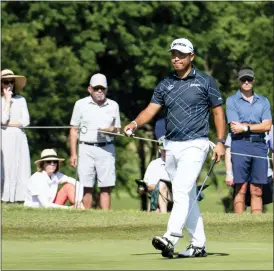  ?? EMIL LIPPE — THE ASSOCIATED PRESS ?? Hideki Matsuyama, of Japan, reacts after putting on the 18th hole during the first round of the AT&T Byron Nelson golf tournament in Mckinney, Texas, on Thursday.