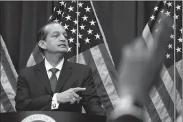  ?? ASSOCIATED PRESS ?? LABOR SECRETARY ALEX ACOSTA calls on a reporter to ask a question during a news conference at the Department of Labor Wednesday in Washington.