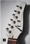  ??  ?? 2 Anderson’s headstock design is one of the few non-Fender six-a-sides that really works. It’s both elegant and practical, like the gorgeous, aged nickel locking tuners with ‘bean’ style buttons