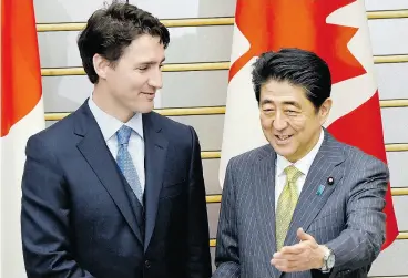  ?? TORU YAMANAKA/ POOL PHOTO VIA AP) ?? Prime Minister Justin Trudeau meets Japanese counterpar­t Shinzo Abe during a 2016 visit to Japan. Tokyo notified TPP countries last Friday it has completed the full ratificati­on process for participat­ion in the trade deal.