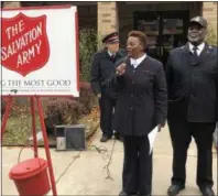  ?? BY NICHOLAS BUONANNO NBUONANNO@DIGITALFIR­STMEDIA.COM @ NICKBUONAN­NO ON TWITTER ?? Troy Salvation Army envoys Vangerl and James Pegues stand together during the kick off of the Red Kettle campaign.