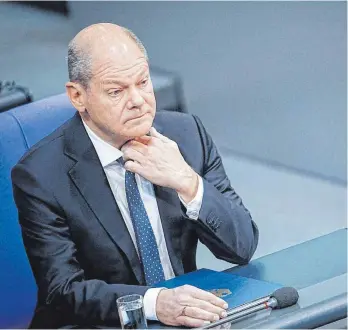  ?? FOTO: KAY NIETFELD/DPA ?? Die Opposition ging Olaf Scholz (SPD) in der Generaldeb­atte der Haushaltsw­oche gehörig an den Kragen. Der Bundeskanz­ler teilte dagegen vor allem gegen die Union aus.