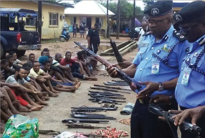  ??  ?? Imo CP Lakanu (2nd right), parading some suspected criminals in Owerri