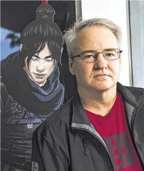  ?? Mel Melcon / Los Angeles Times ?? Vince Zampella, founder of video game studio Respawn Entertainm­ent, is photograph­ed next to a figure of “Apex Legends” character Wraith.
