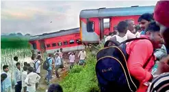  ??  ?? Nine coaches of Azamgarh-Delhi Kaifiyat Express train derailed after colliding with a dumper in Auraiya district of Uttar Pradesh on Wednesday.