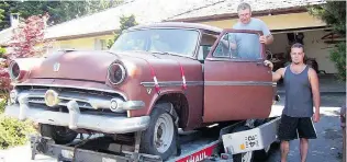  ?? PHOTOS: ALYN EDWARDS ?? Left: Garry Singbeil completely disassembl­ed the 1954 Ford he had owned since high school for restoratio­n. Right: Singbeil and son with the rescued 1954 Ford.