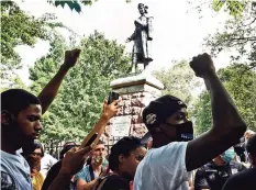  ?? Peter Hvizdak / Hearst Connecticu­t Media ?? The statue of Christophe­r Columbus was removed from Wooster Square park in June, hours after a skirmish erupted early in the morning between people of opposing viewpoints.