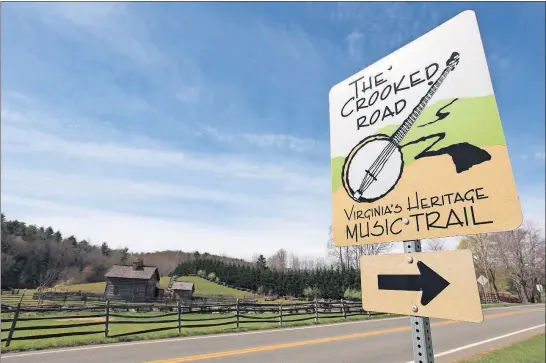  ?? [STEVE STEPHENS/DISPATCH PHOTOS] ?? A sign outside the Blue Ridge Institute & Museum marks the Crooked Road heritage trail near Galax, Va.