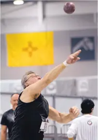  ??  ?? Steven Ross lets the shot fly for a throw of 46-8¾-inches to take second in the men’s 60 age division.