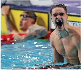  ?? GETTY IMAGES ?? SHOCK: Ex-Loughborou­gh University student James Wilby wins the 100m Commonweal­th breaststro­ke title, with team-mate Peaty fourth. Below, Peaty celebratin­g his 50m breaststro­ke title and , left, with his two gold medals and silver medal from the Tokyo Olympics