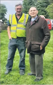  ?? (Pic Kaye English) ?? John Mills and Rev Walter Hill at the Knockmourn­e Vintage Car & Tractor Run.