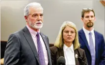  ?? EMILY HANEY / EMILY.HANEY@AJC.COM ?? At a Jonesboro news conference Friday, Insurance Fraud Unit Director Billy Sullivan (left) details a fraud bust with Clayton DA Tracy Graham Lawson and Assistant DA John Fowler.