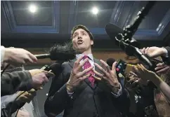  ?? JACQUES BOISSINOT / THE CANADIAN PRESS FILES ?? Prime Minister Justin Trudeau talks to reporters after a G7-related meeting in Quebec City last month.