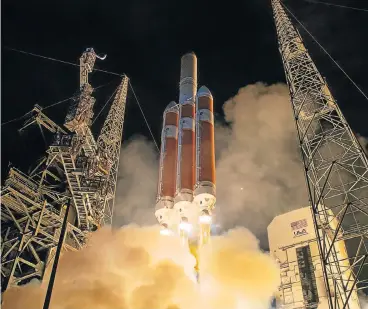  ?? /AFP ?? Starship: This handout photo released by Nasa shows the United Launch Alliance Delta IV Heavy rocket with the Parker Solar Probe on board during its launch on Sunday at Launch Complex 37 at Cape Canaveral Air Force Station in Florida.