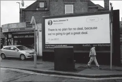  ?? The Associated Press ?? LONDON: A billboard is displayed Feb. 8 in London as part of the campaign for Britain to remain in the European Union by the “Led By Donkeys” group. Four friends have recently started posting quotes and Tweets by pro-Brexit politician­s to highlight what the group see as their hypocrisy, dubbing their billboard campaign “Led by Donkeys,” after the descriptio­n of British soldiers in World War I as “lions led by donkeys.” The billboards are now going nationwide, after a crowdfundi­ng campaign raised almost 150,000 pounds ($193,000). The British and Irish leaders were meeting Friday to discuss the Irish border, and mend fences, amid rising tensions between Britain and the European Union over Brexit.