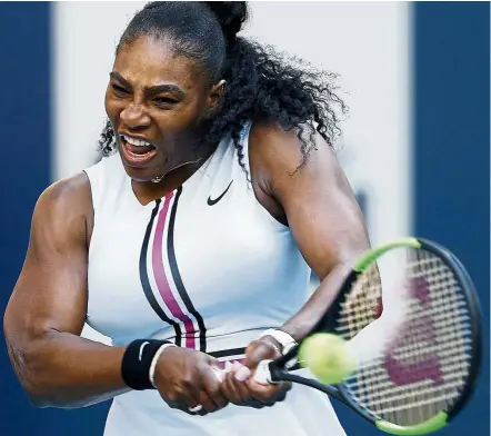  ?? — AFP ?? Complacent: Serena Williams survived a second-set lull before beating Rebecca Peterson 6-3, 1-6, 6-1 in the Miami Open on Friday.