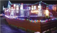  ??  ?? Christmas lights on the log cabins in Bettystown.