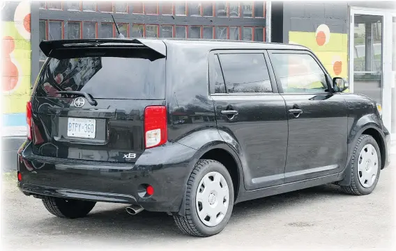  ?? — PHOTOS: LESLEY WIMBUSH/DRIVING ?? The Scion xB’s boxy lines mean plenty of cargo space, especially when the rear seats are folded down.