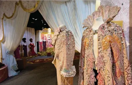  ?? ALLEN EYESTONE / THE PALM BEACH POST ?? Clothing worn by Liberace is seen at the Costume Museum at the Wick Theatre in Boca Raton, which is doing a presentati­on titled “Bling” that includes Liberace costumes.