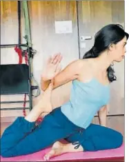  ??  ?? Mallika Sherawat in a onelegged king pigeon pose