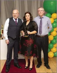  ??  ?? Frances Kearns, camogie player of the year, with manager Stephen Kelly and selector Eugene Condon.