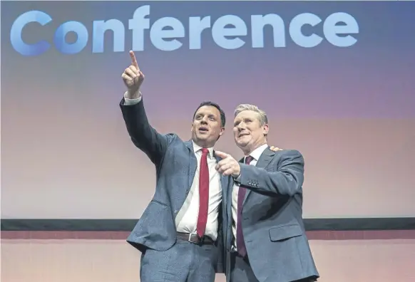  ?? PICTURE: JANE BARLOW/PA WIRE ?? Labour leader
Sir Keir Starmer with Scottish Labour leader Anas Sarwar after speaking during the Scottish Labour Party conference in Glasgow at the weekend