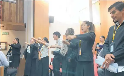  ?? Photo / Susan Botting ?? Te Kapua Whetu students perform an impromptu haka after a move to overturn Ma¯ ori wards was voted down at yesterday's Whanga¯ rei District Council meeting.