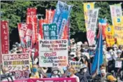  ?? REUTERS ?? Protesters march against the talks between the US, Japan and other Quad leaders in Tokyo, Japan.