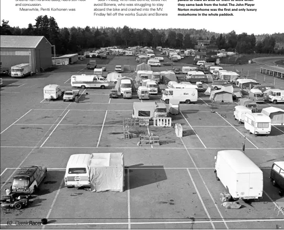  ??  ?? Below: The Anderstorp paddock still asleep in the early morning. No people around, just the vans and tents of the competitor­s. Even the sidecar of Rudi Kurth and Dane Rowe is standing in the open air during the night. MV Agusta has left some wooden...