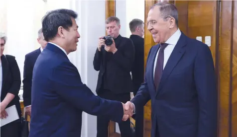  ?? (Russian Foreign Ministry/Reuters) ?? CHINESE SPECIAL Envoy for Eurasian Affairs Li Hui meets Russian Foreign Minister Sergei Lavrov in Moscow, last week. Beijing, which nurtures robust ties with Russia, has also establishe­d a hotline with Ukraine.