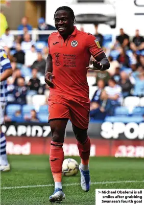  ?? ?? Michael Obafemi is all smiles after grabbing Swansea’s fourth goal