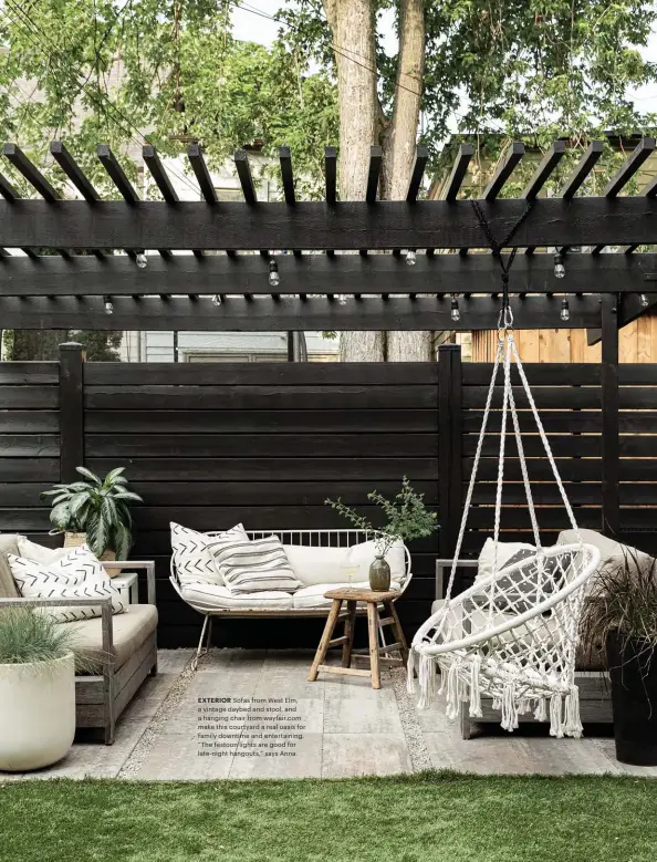  ??  ?? EXTERIOR Sofas from West Elm, a vintage daybed and stool, and a hanging chair from wayfair.com make this courtyard a real oasis for family downtime and entertaini­ng. “The festoon lights are good for late-night hangouts,” says Anna.