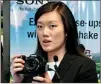 ??  ?? Sony South East Asia Digital Imaging Product Marketing's Tan Hwee Ling explains the features of the New DSC-H-100 digital camera