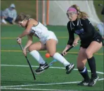  ?? GENE WALSH — DIGITAL FIRST MEDIA ?? Plymouth Whitemarsh’s Hailey Copestick leaps to avoid contact with the ball near Central Bucks South’s Annie Brady during their District 1-3A second round game Wednesday.