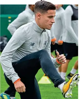  ?? EPA ?? Back in contention: Coutinho training yesterday