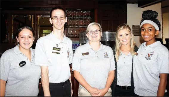  ?? Becky Ungerer NWA Democrat-Gazette/CARIN SCHOPPMEYE­R ?? (from left), Terry Joe Robinson, Casandra Purtle, Brooke Crosby and Aziza-Naajee Gunn volunteer at Golf 4 a Cause to benefit Ronald McDonald House Charities on Aug. 28 at Pinnacle Country Club in Rogers.