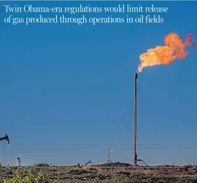  ?? ROBERTO E. ROSALES/JOURNAL ?? Methane is flared off in an oil field near Artesia. The Trump administra­tion is delaying imposition of two Obama-era rules aimed at cutting methane emissions from oil and gas production.