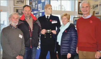  ?? 17_t45_WarMuseum0­1 ?? Bill Leech and Fergus Gillanders from Oban War and Peace Museum and Gordon and Jane Thomson who were the 700,000th thousand visitors.