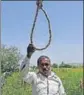  ??  ?? Vishnu Harak and other Shivde farmers are tying nooses to trees — saying they will commit suicide but not part with their land. VIJAYANAND GUPTA/HT PHOTO