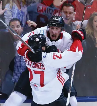  ?? JERRY LAI/USA TODAY SPORTS ?? Brad Marchand’s short-handed goal late in the third lifted Canada over Europe for a two-game sweep of the World Cup final.