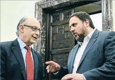  ?? DANI DUCH ?? El ministre Cristóbal Montoro amb el conseller Oriol Junqueras