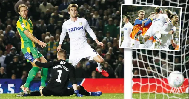  ?? PICTURE: PA Images ?? BREATHING SPACE: Patrick Bamford scores his first and Leeds’ second goal and, inset, is mobbed after netting his second