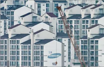  ?? ED JONES/AFP ?? A general view shows a Samsung apartment building in Seoul yesterday.