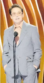  ?? ?? Robert Downey Jr. accepts the award for outstandin­g performanc­e by a male actor in a supporting role for ‘Oppenheime­r’.