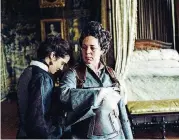  ?? FILMS VIA AP] [YORGOS LANTHIMOS/FOX SEARCHLIGH­T ?? Rachel Weisz and Olivia Coleman, right, in a scene from the film “The Favourite.”