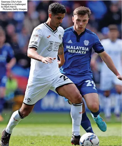  ?? ?? Swansea City’s Kyle Naughton is challenged by Mark Harris
Pictures: Getty Images