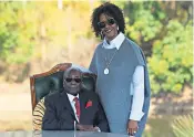  ??  ?? Robert Mugabe poses with his wife, Grace, above, after yesterday’s press conference, below