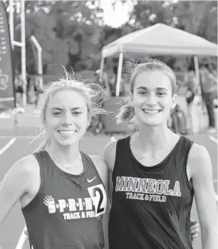  ?? JEFF GARDENOUR/CORRESPOND­ENT ?? Winter Springs’ Caroline Wells (left) and Lake Minneola’s Lily Henne, shown after a regional race, went head to head in two FHSAA state finals on Friday. For coverage of Saturday’s Class 4A state track and field meet, please go to SentinelVa­rsity.com.