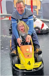  ??  ?? HAVING A SCREAM Sophia and dad at play centre