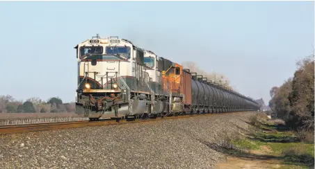  ?? Jake Miille / Special to The Chronicle 2013 ?? A BNSF train carries crude oil from North Dakota to Bakersfiel­d in 2013. Oil-by-rail operations have been expanding in the U.S.